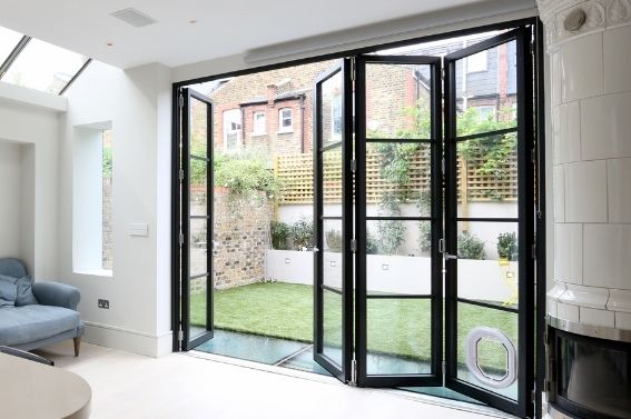 sieger legacy steel look aluminium bifold door with glazing bars