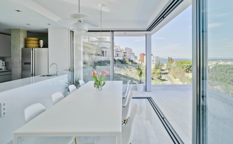 Glazing such as slim sliding doors with a 20mm sightline and frameless glass balustrades are perfect for this type of project, where maximising natural light and having panoramic uninterrupted views are the main priorities. By using frameless glass balustrades on the external balcony there is no obstruction of natural light or views as there is a clear path through the doors and balustrade, both of which have excellent levels of clarity. Amazing views deserve to be appreciated at all times. Materials in this build were carefully selected to ensure the most was made of the stunning views and to give the property a peaceful and serene ambiance. 
