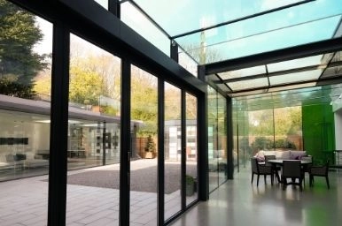 structural glazing and glass roof with colour glass in the sieger system glazing showroom in Amersham
