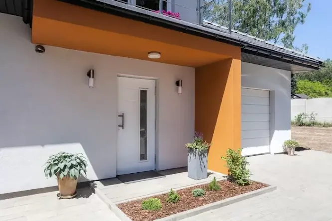 white contemporary aluminium entrance door with vertical glass pane