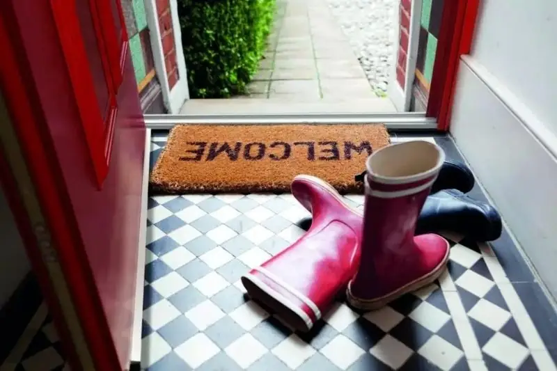 red aluminium entrance door in a family home