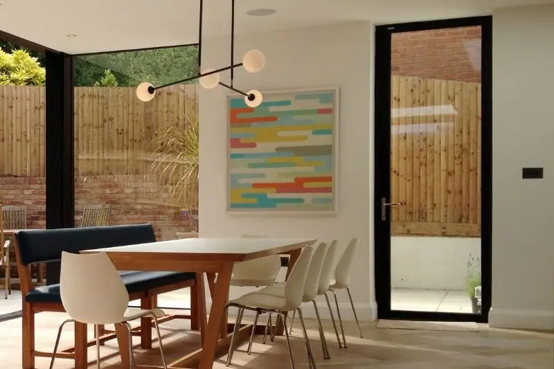 slim framed aluminium Schuco casement door in a modern home extension