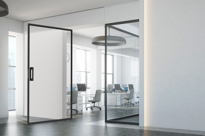 MIRO Pivot internal glass pivot door in a modern office space