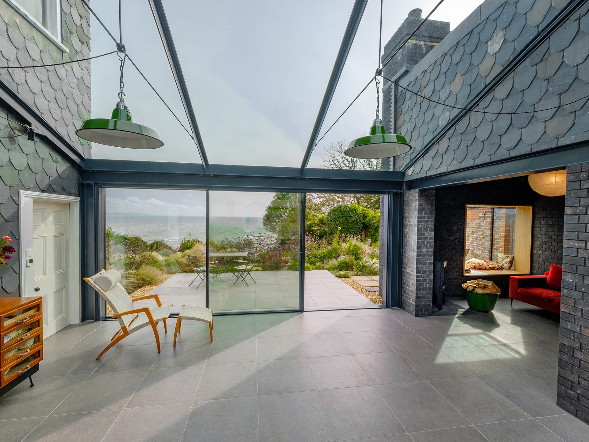 Sieger Systems Hero Image - Seaside VIew through Slim Sliding Door