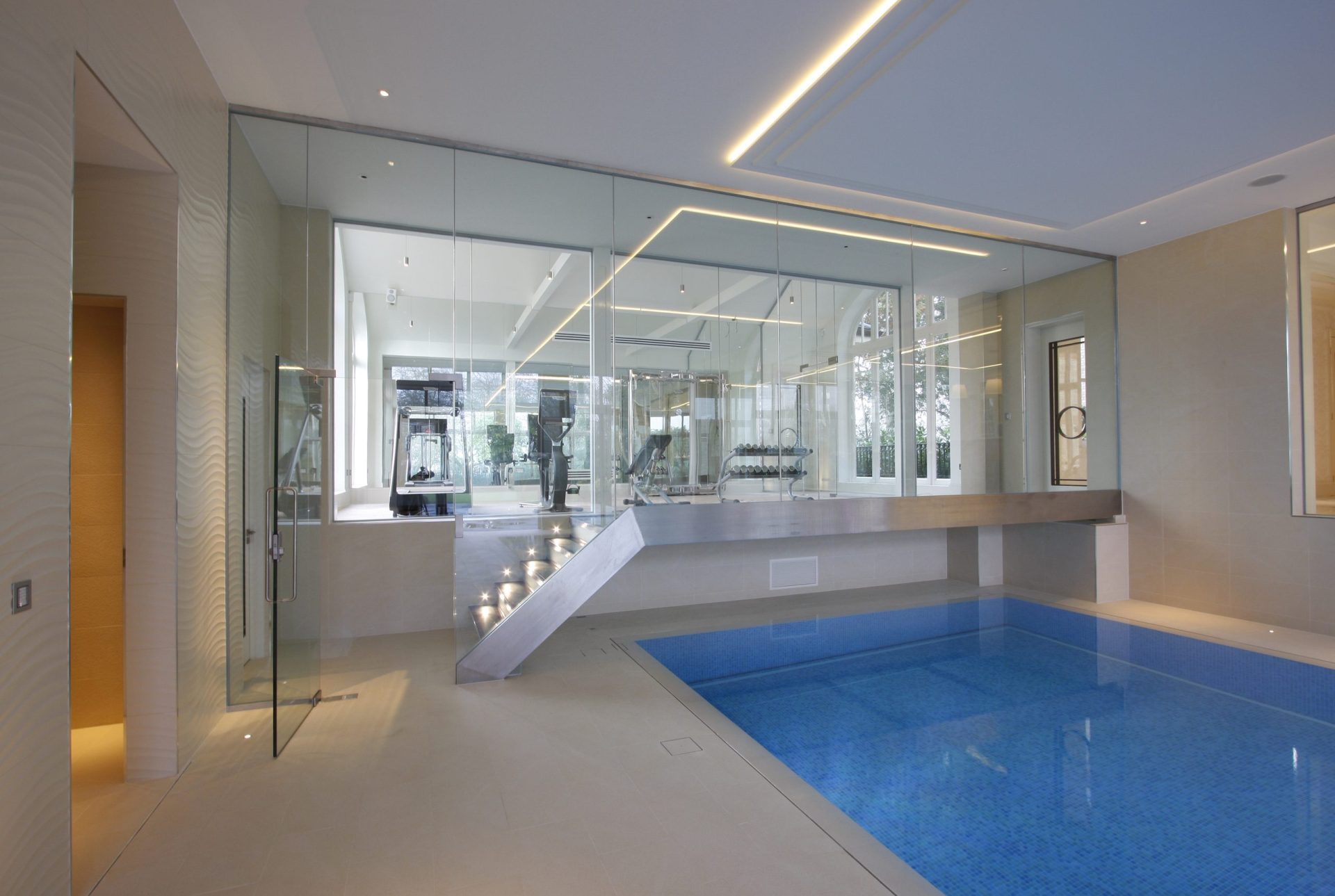 a pool room protected by a frameless fire rated glass wall - oak lodge - fire rated glass - sieger systems